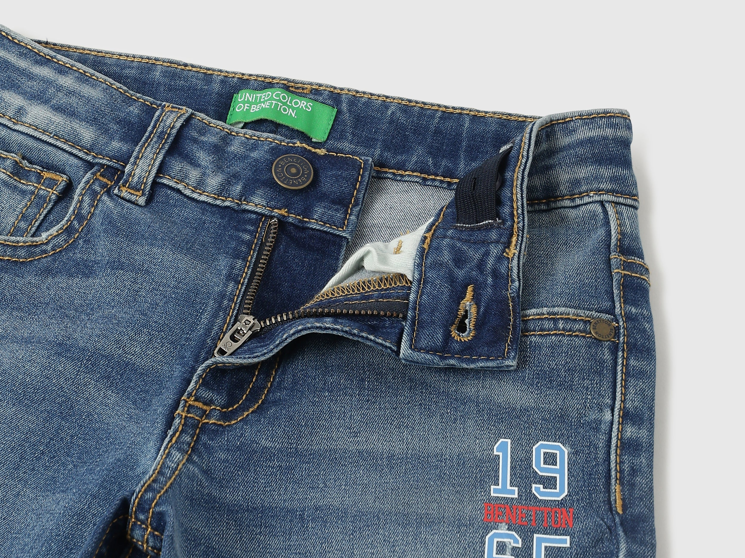 Boys Mid Blue Bootcut Denim with Distressed Detailing