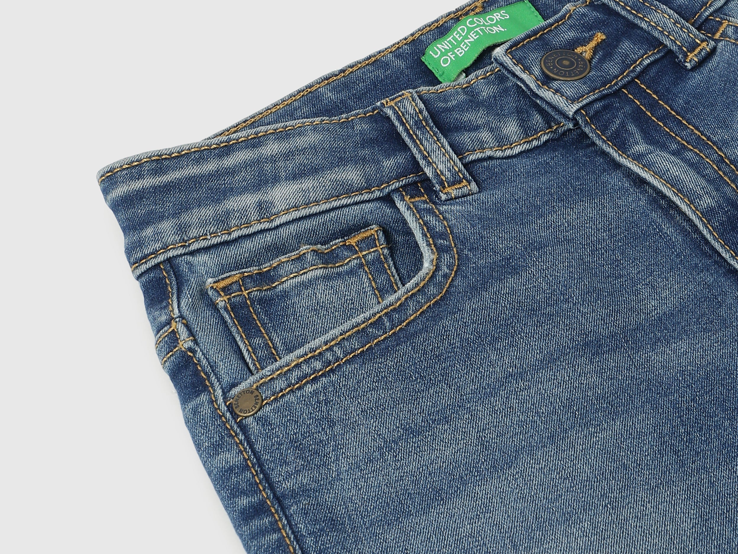 Boys Mid Blue Bootcut Denim with Distressed Detailing